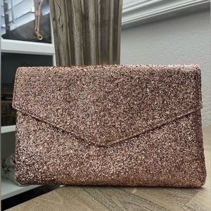 BRAND NEW!!!! Rose gold clutch’ beautiful!!!